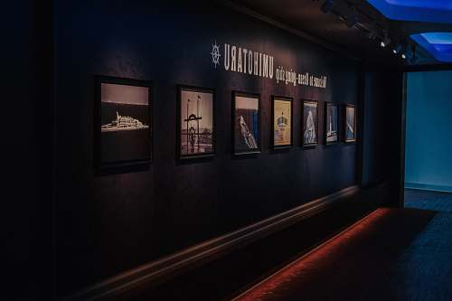 art gallery ships poster on wall corridor